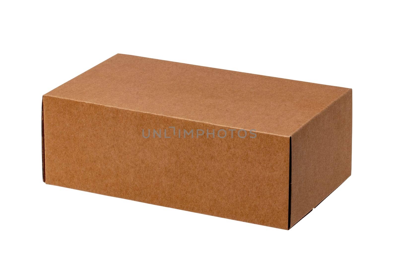 Closed brown cardboard box or kraft paper box with clipping path isolated on white background. Suitable for packaging. Macro.