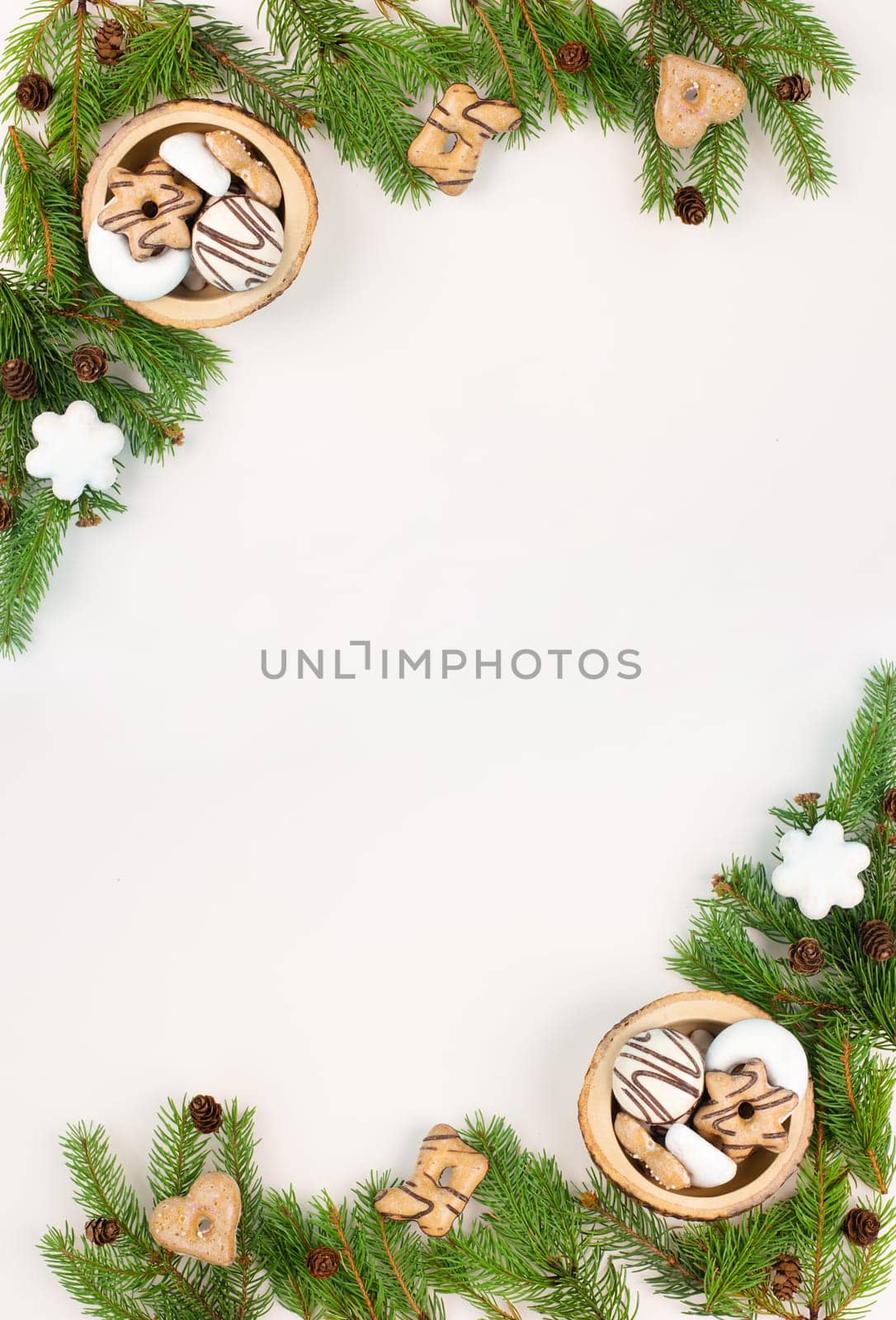 Christmas tree made from fir branches, red stars and a cinnamon stick as the trunk, greeting card with copy space