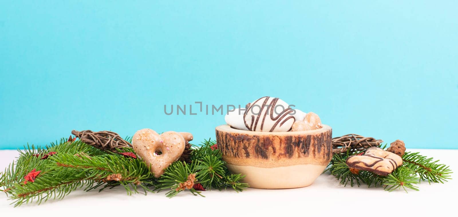 Nurnberg elisen gingerbread mix, traditional german christmas sweets with fir branches and pine cones, holiday background with copy space