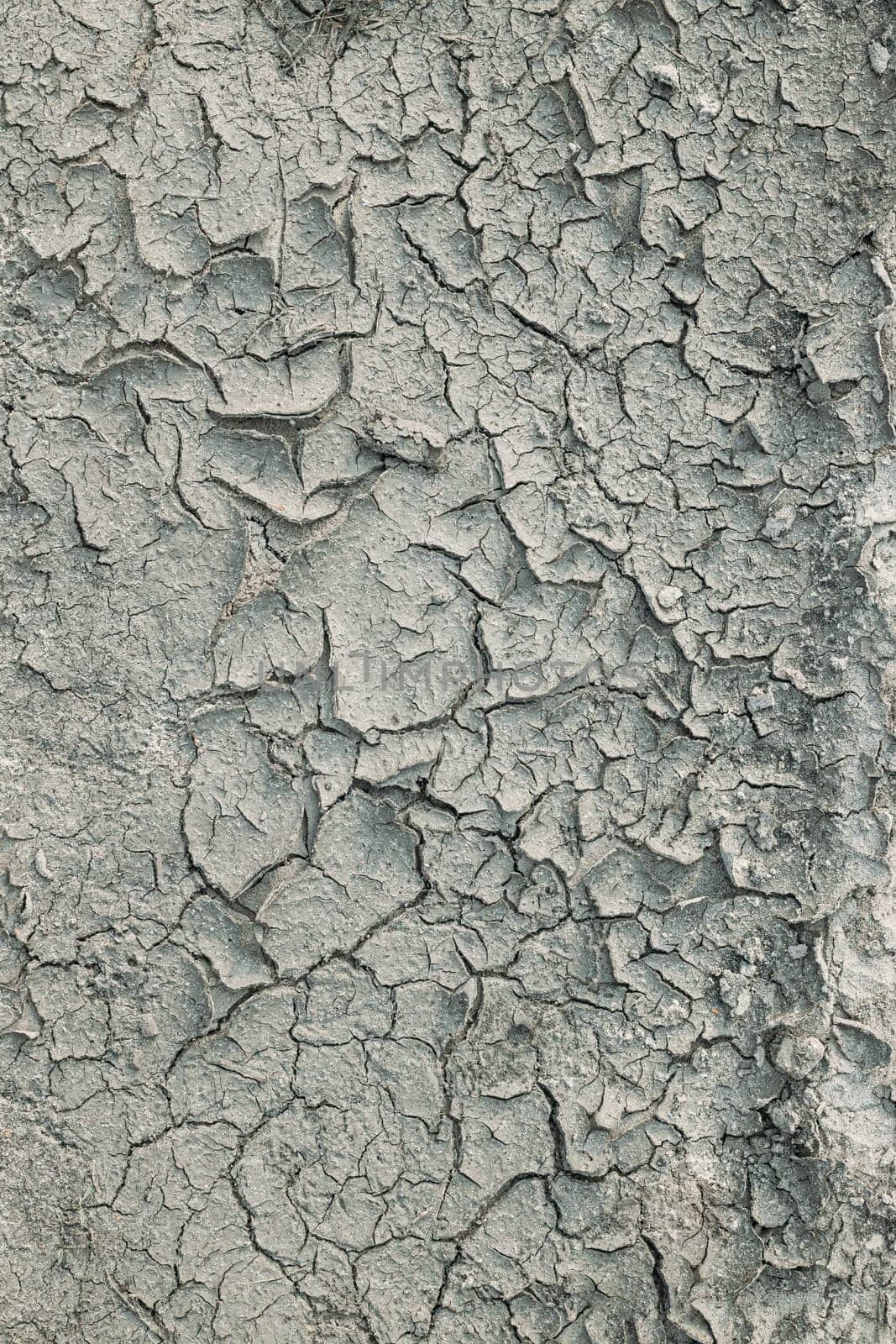 Background Of Dry Cracked Soil Dirt Or Earth During Drought. Dry Cracked Earth Depicting Severe Drought Conditions.