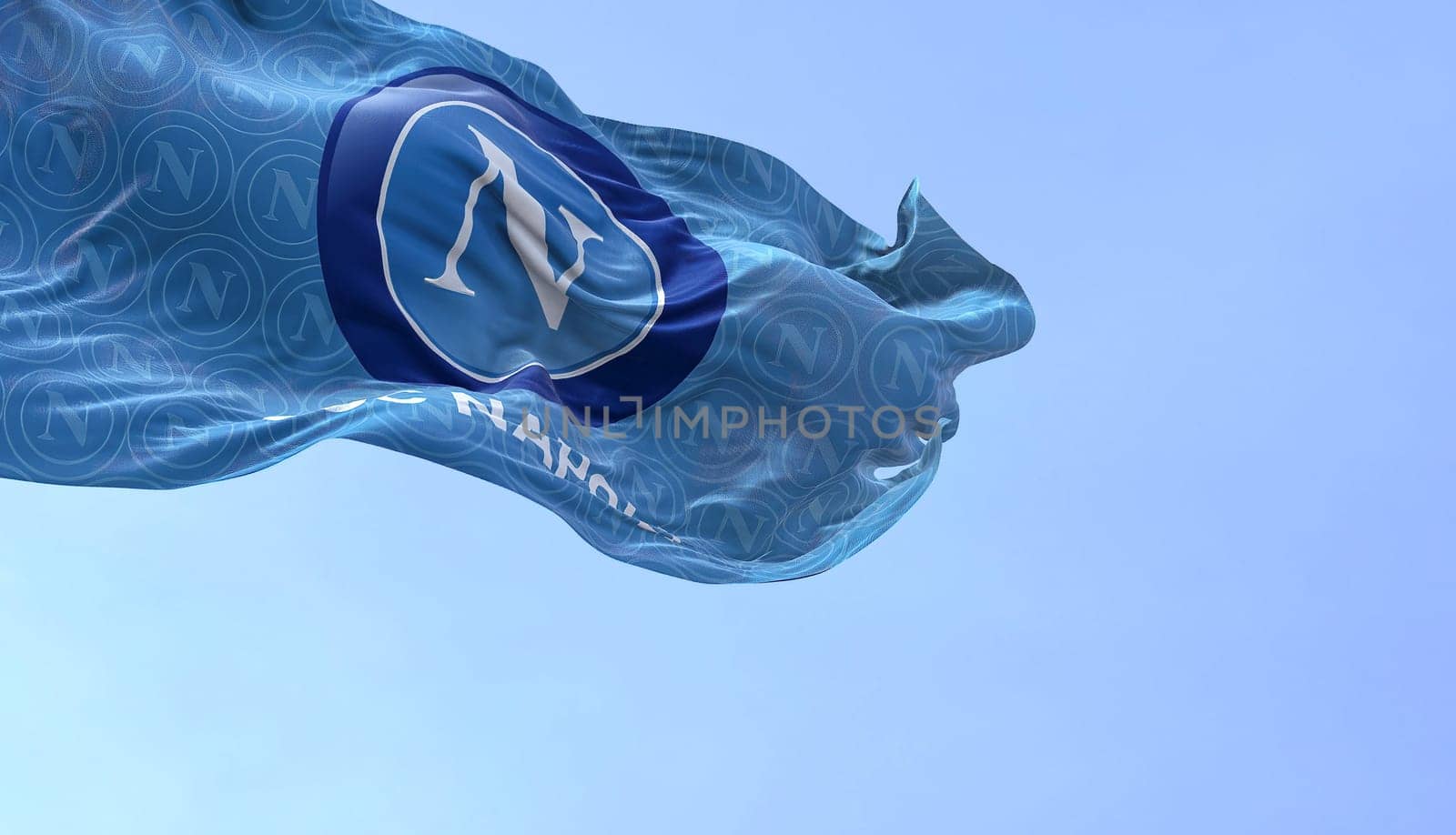 Naples, Italy, July 2022: The flag of SSC Napoli waving. SSC Napoli is a professional football club based in Naples, Italy.