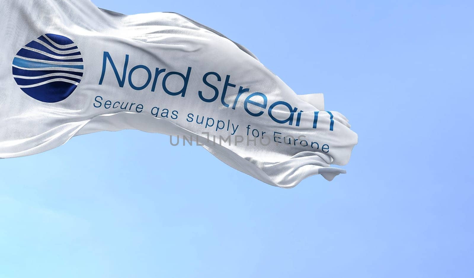 Greifswald, GER, September 2022: Flag with the Nord Stream logo waving to the fan on a clear day. Nord Stream is a gas pipeline that directly transports Russian gas to Western Europe.
