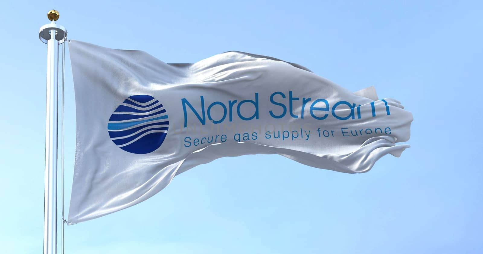 Greifswald, GER, September 2022: Flag with the Nord Stream logo waving to the fan on a clear day. Nord Stream is a gas pipeline that directly transports Russian gas to Western Europe.