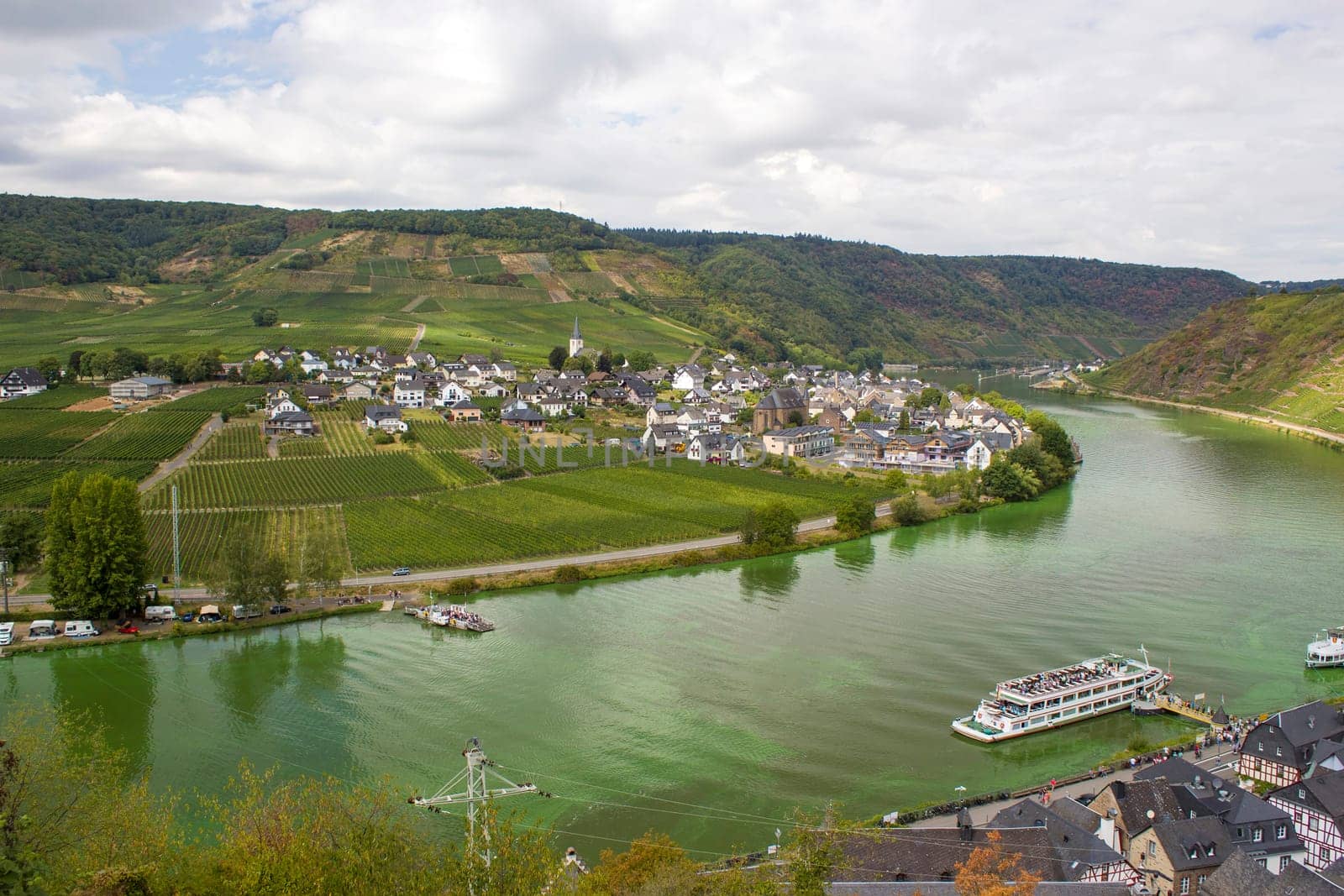 Aerial view of the Moselle valley with vineyards, the river Moselle and the villages Ellenz-Poltersdorf and Poltersdorf seen from castle Metternich in Beilstein, Rhineland-Palatinate, Germany.