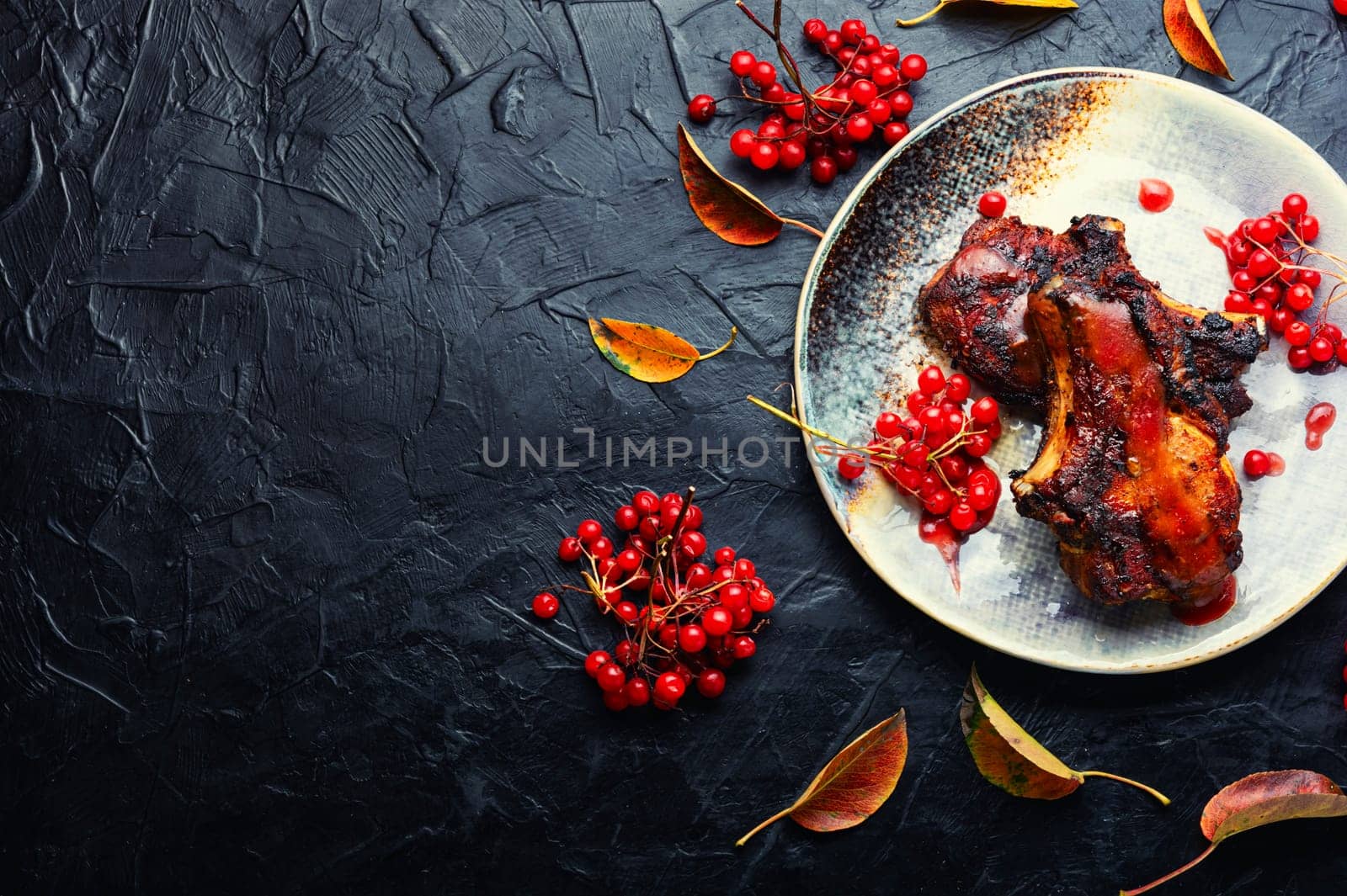 Delicious pork steak roasted with berry sauce.Copy space