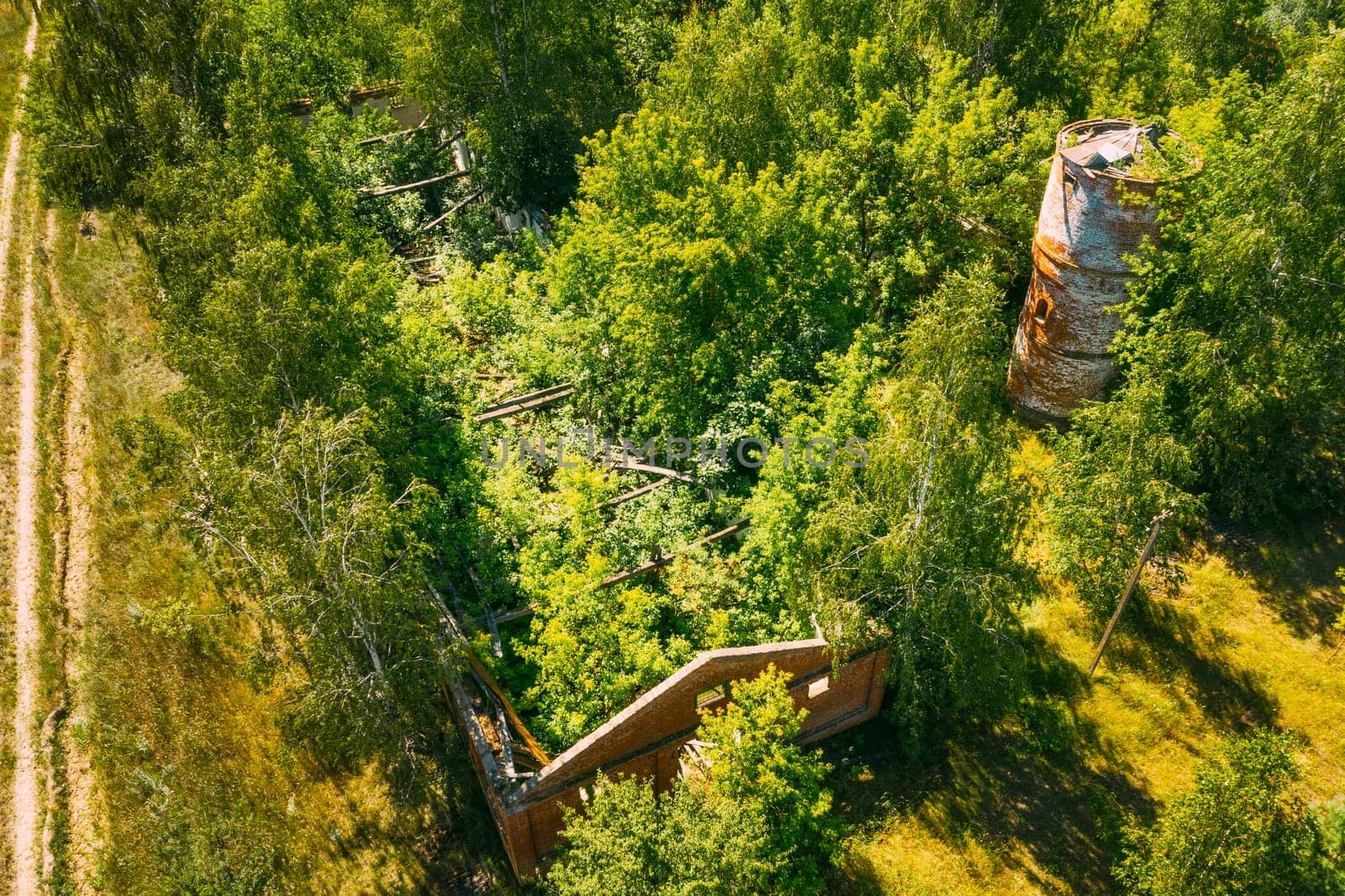 Belarus. Aerial View Of Ruined Cowshed In Chernobyl Zone. Chornobyl Catastrophe Disasters. Dilapidated House In Belarusian Village. Whole Villages Must Be Disposed. Chernobyl Resettlement Zone.