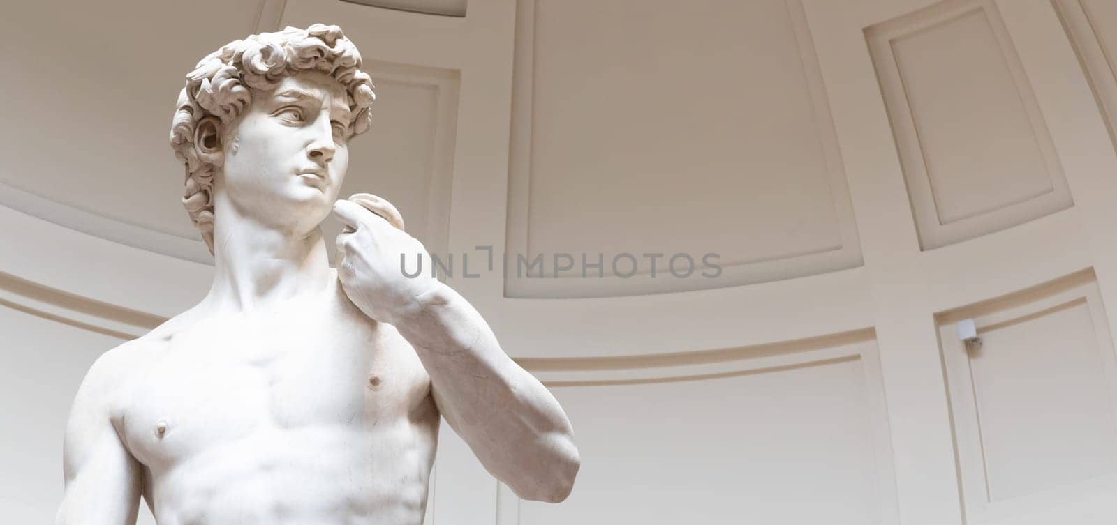 Florence, Italy - Circa August 2021: David sculpture by Michelangelo Buonarroti. The masterpiece of the Renaissance art.