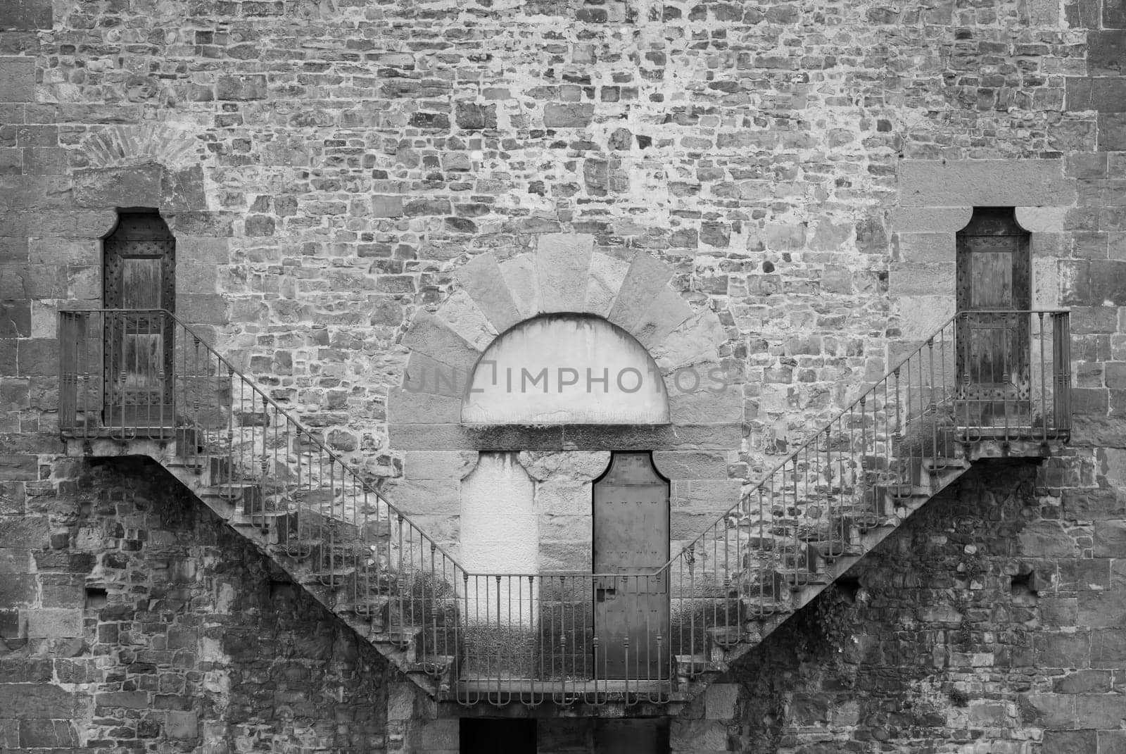 Exterior of antique building with Escher architecture style. Simmetry and geometric perspective.