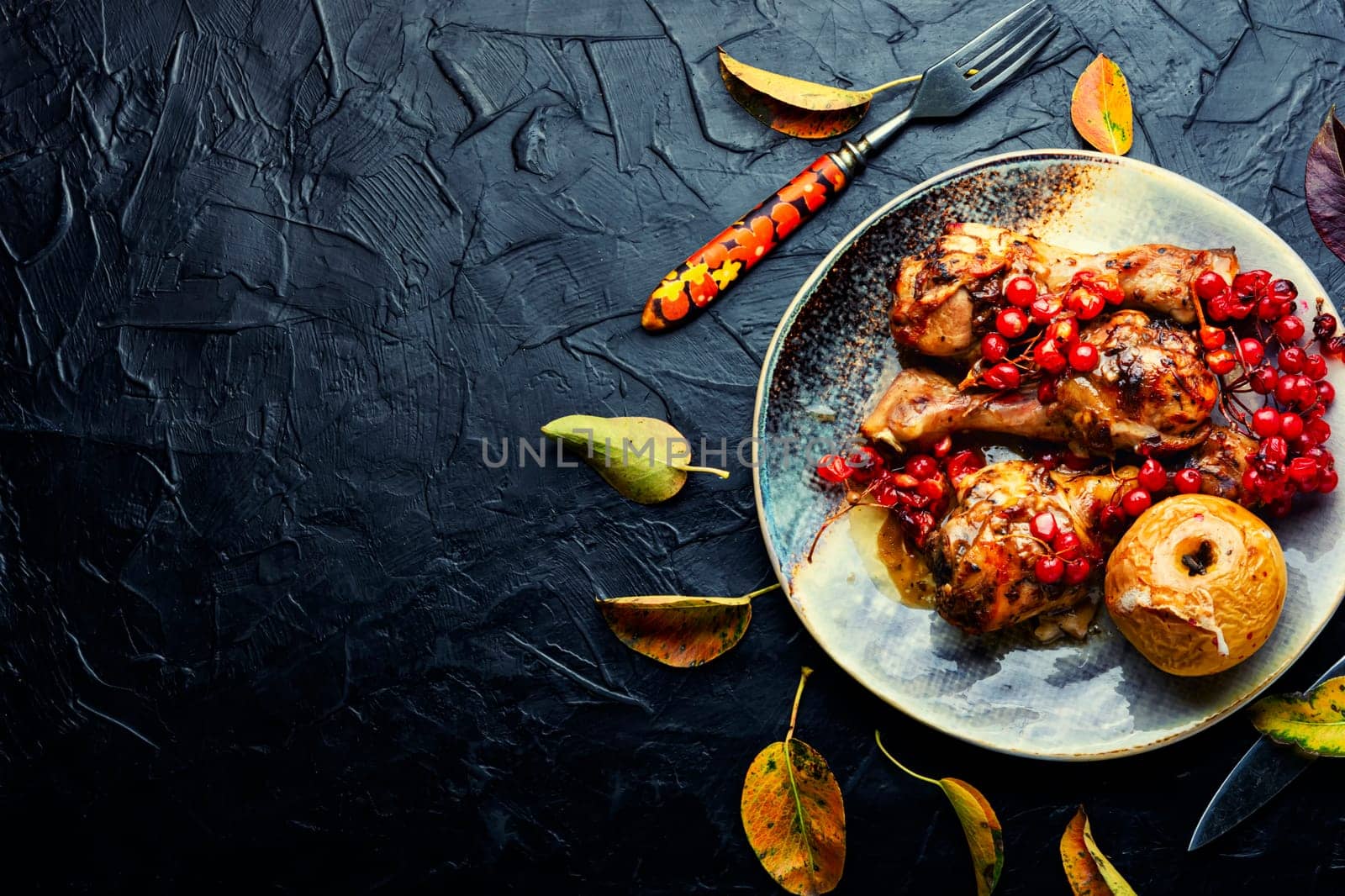 Chicken legs with berry sauce.Chicken roasted drumsticks.Copy space