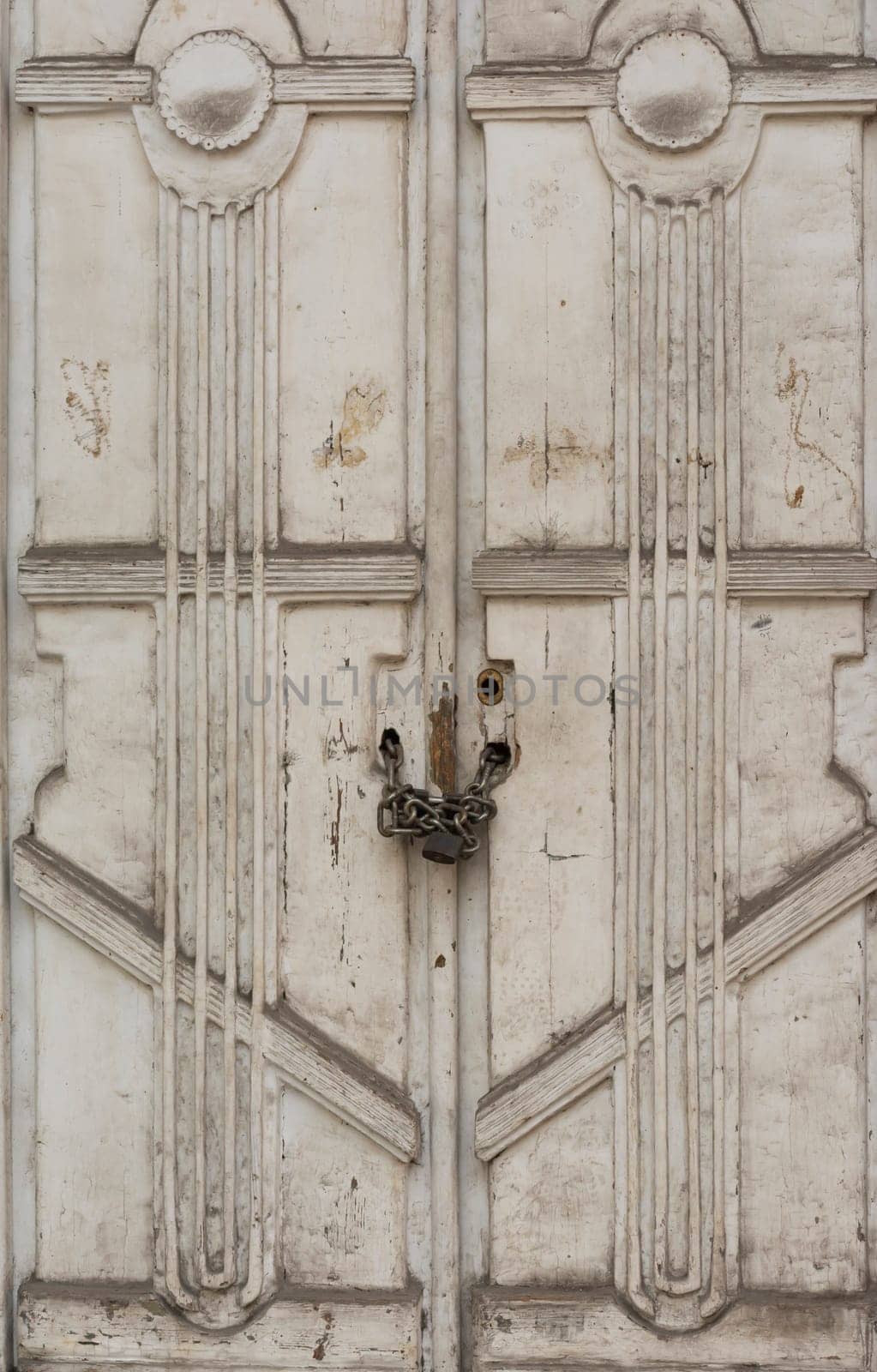 Old door with chain and padlock , security concept
