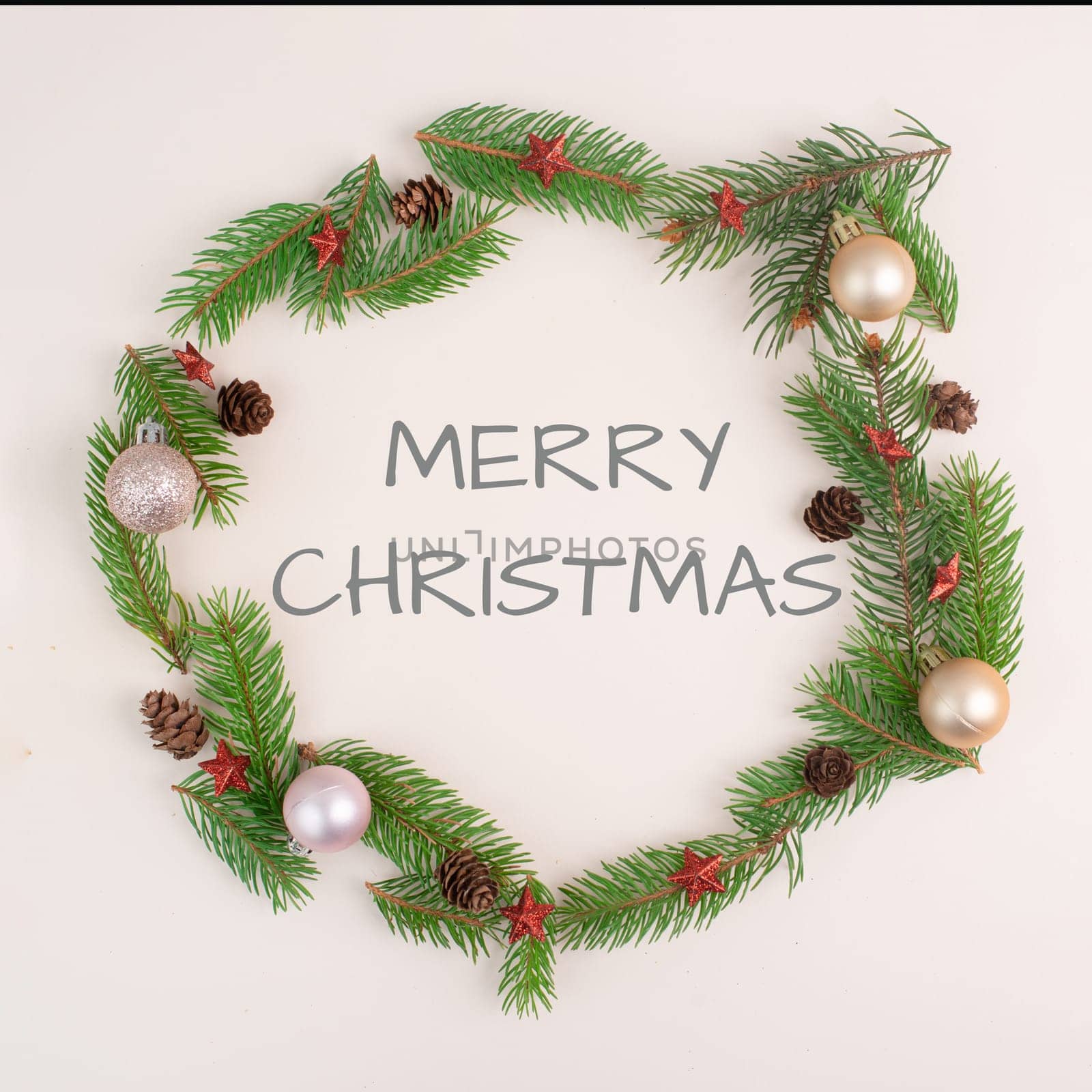 Merry christmas holiday background, frame with fir branches, baubles and cones, winter season greeting card