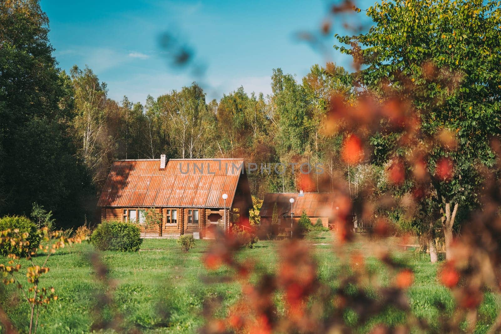 Berezinsky, Biosphere Reserve, Belarus. Traditional Belarusian Tourist Guest Houses In Early Autumn Landscape. Popular Place For Rest And Active Eco-tourism In Belarus.