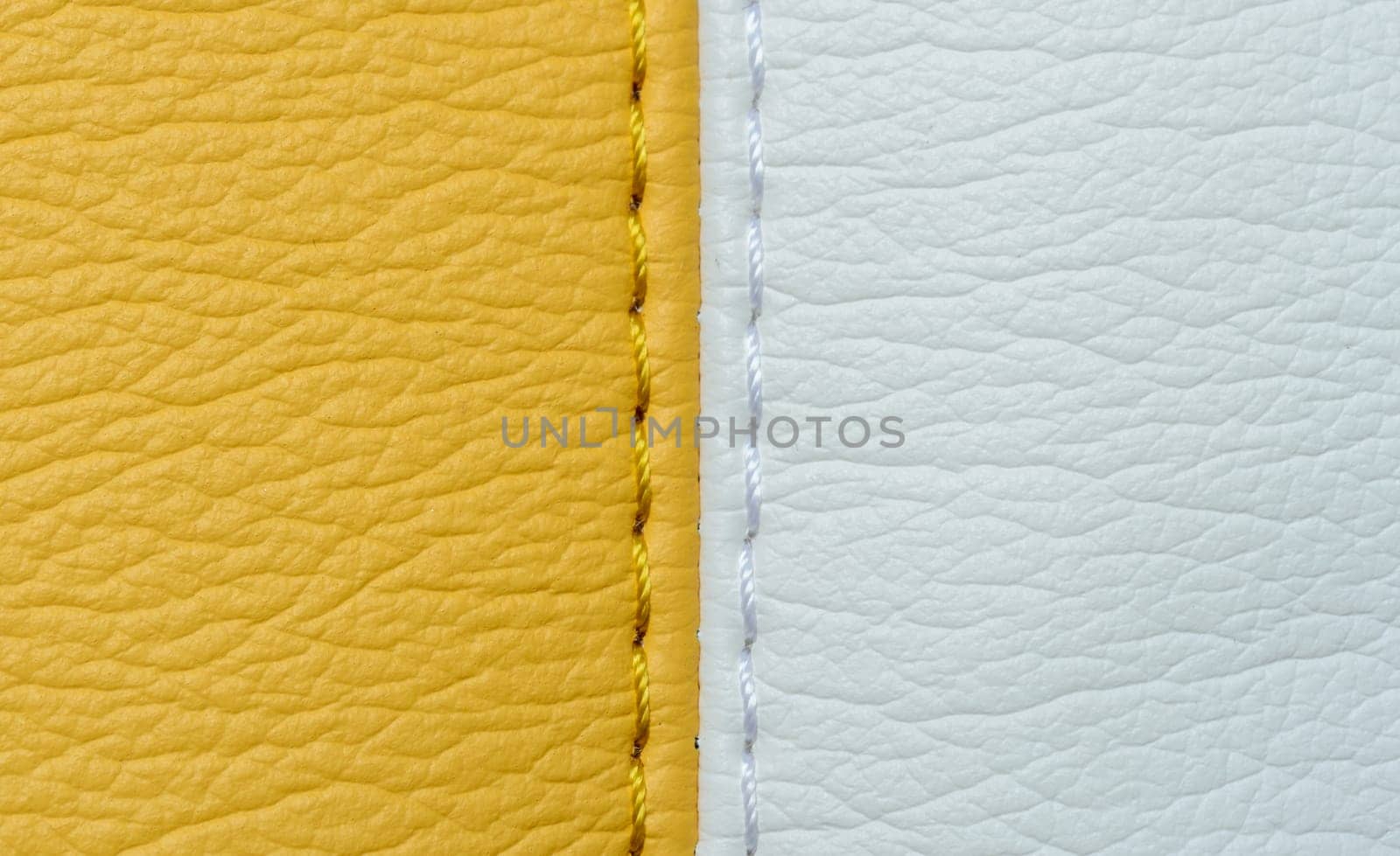 Yellow and white leather texture background with stitch