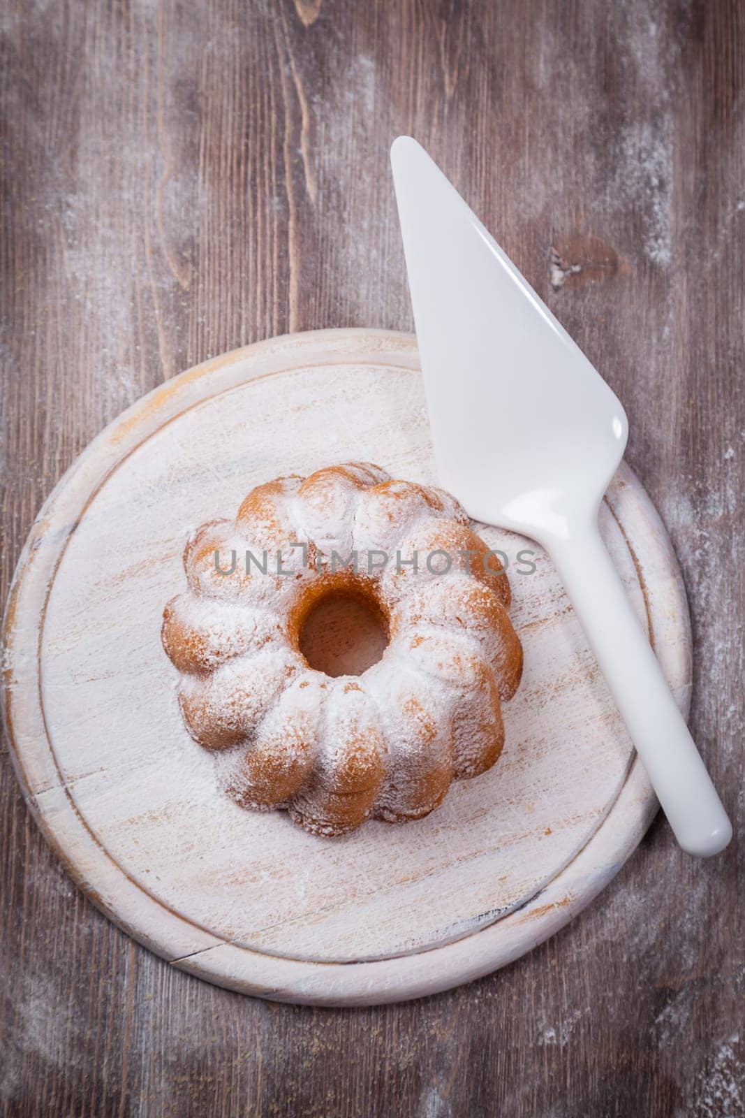 Homemade marble cake on wooden table
