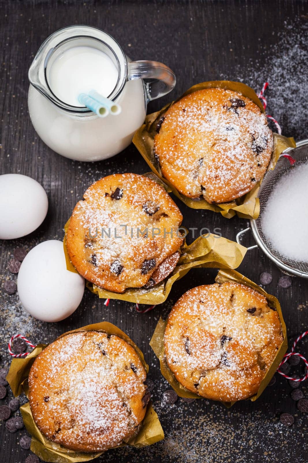 Homemade muffins with baking ingredients