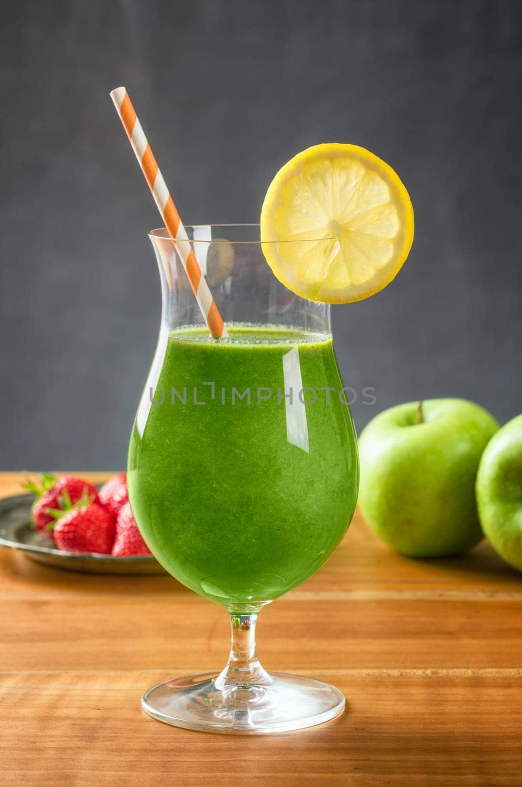 Green smoothie in a cocktail glass