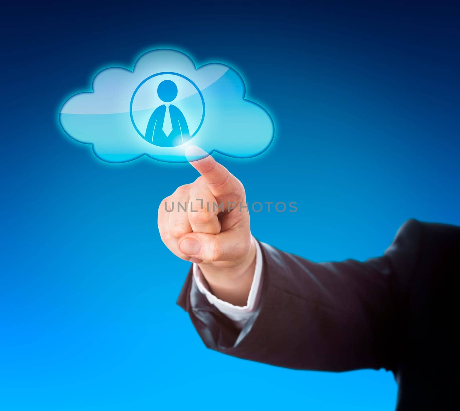 Arm in dark blue business suit reaching out to point at a knowledge worker icon inside a floating cloud computing symbol. Technology metaphor for resource pooling and smart computing solutions.