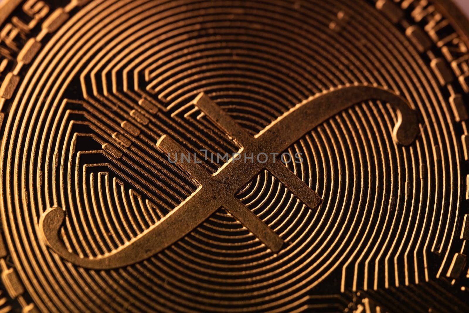 top view extreme macro closeup of crypto filecoin golden coin with letter f symbol logo