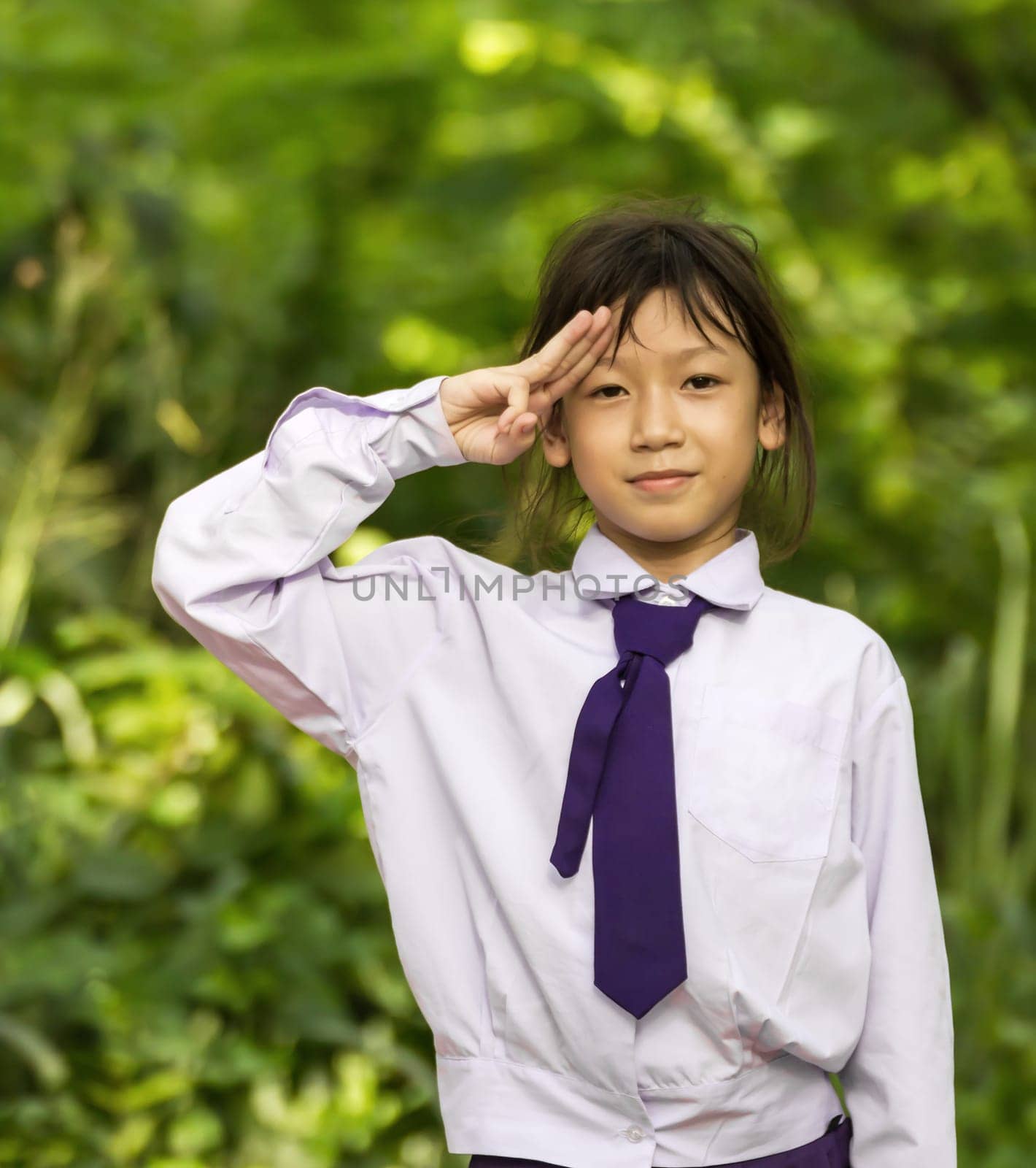 Asian girl student relaxing  in the park