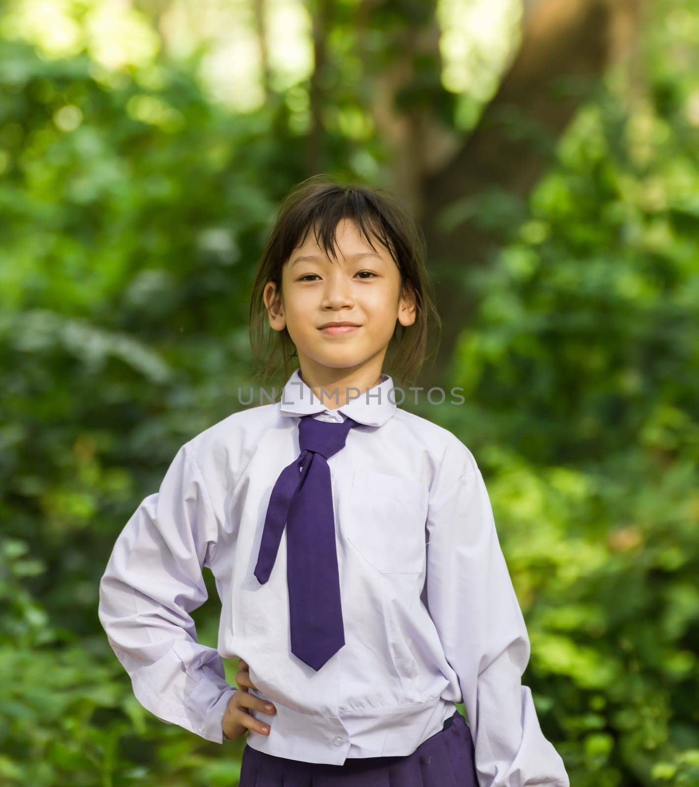 Asian girl student relaxing  in the park