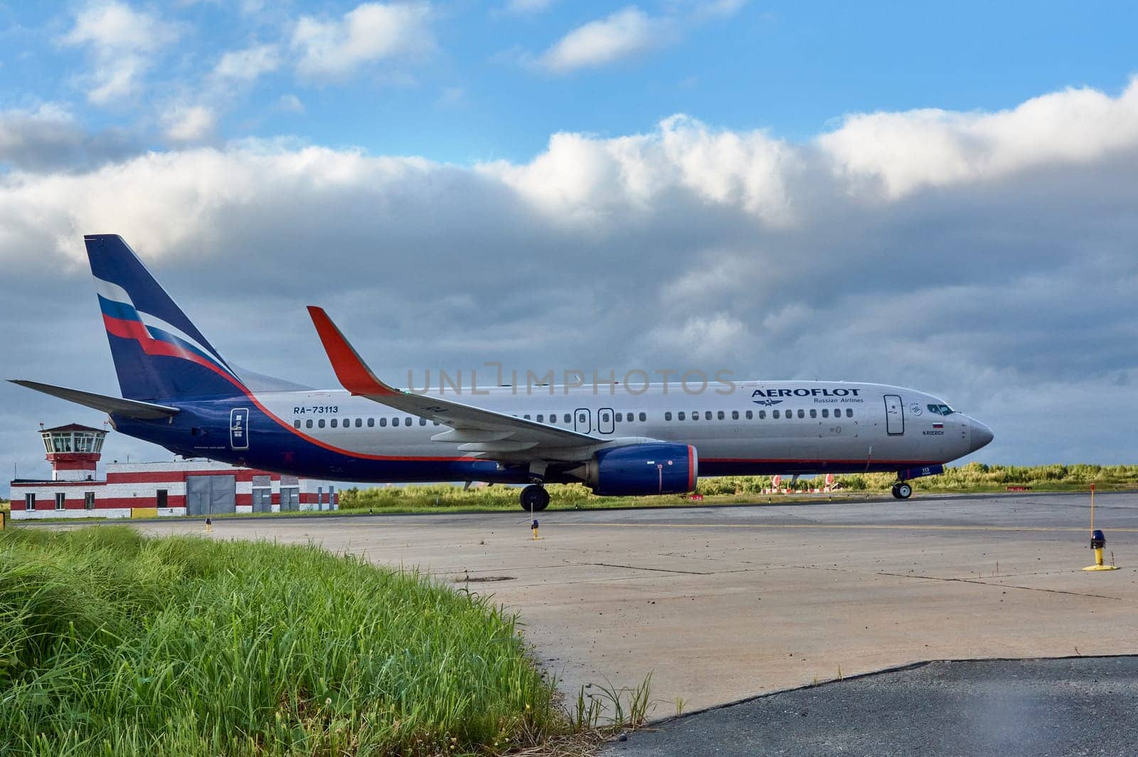 The Boeing aircraft is taxiing along the runway. Talagi Airport, Arkhangelsk, Russia, 27,08,2022. High quality photo