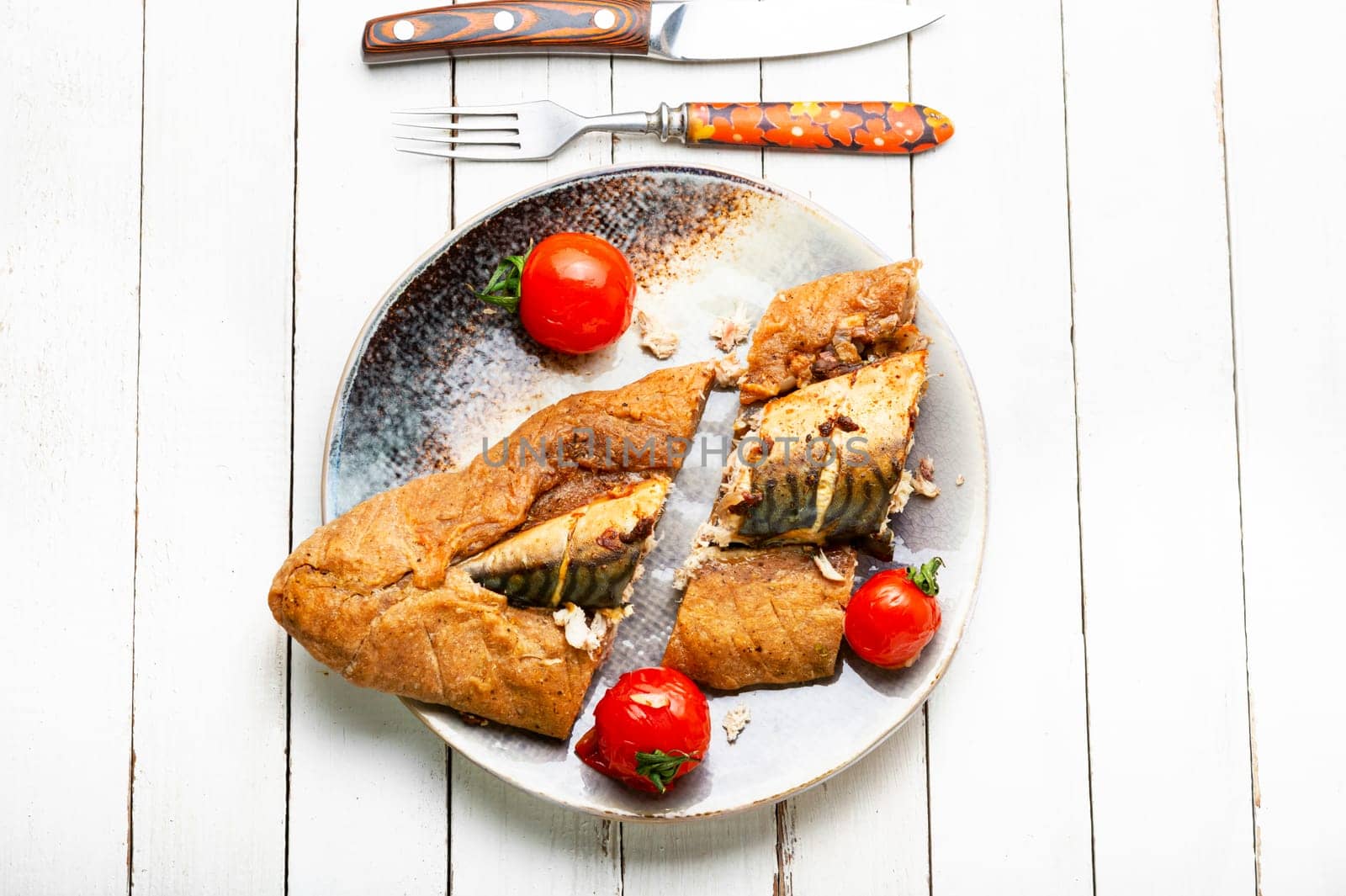 Delicious mackerel fish baked in dough