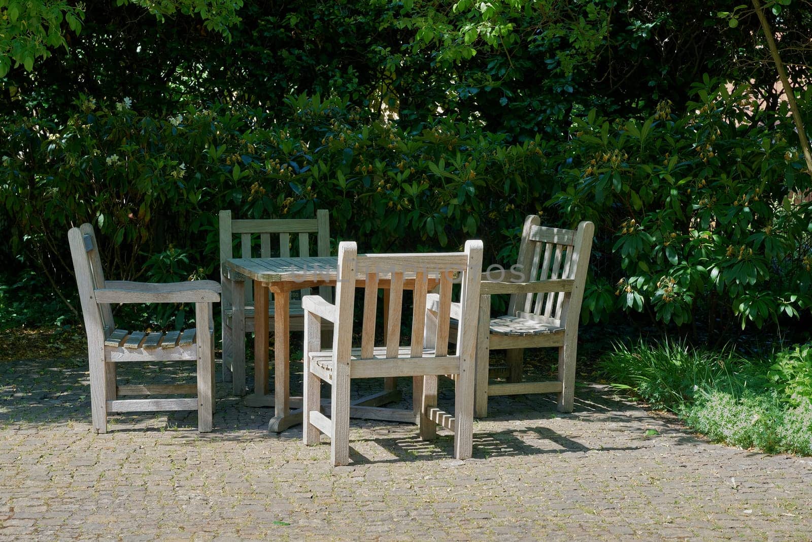 Chairs and table to rest in a cozy corner in the garden