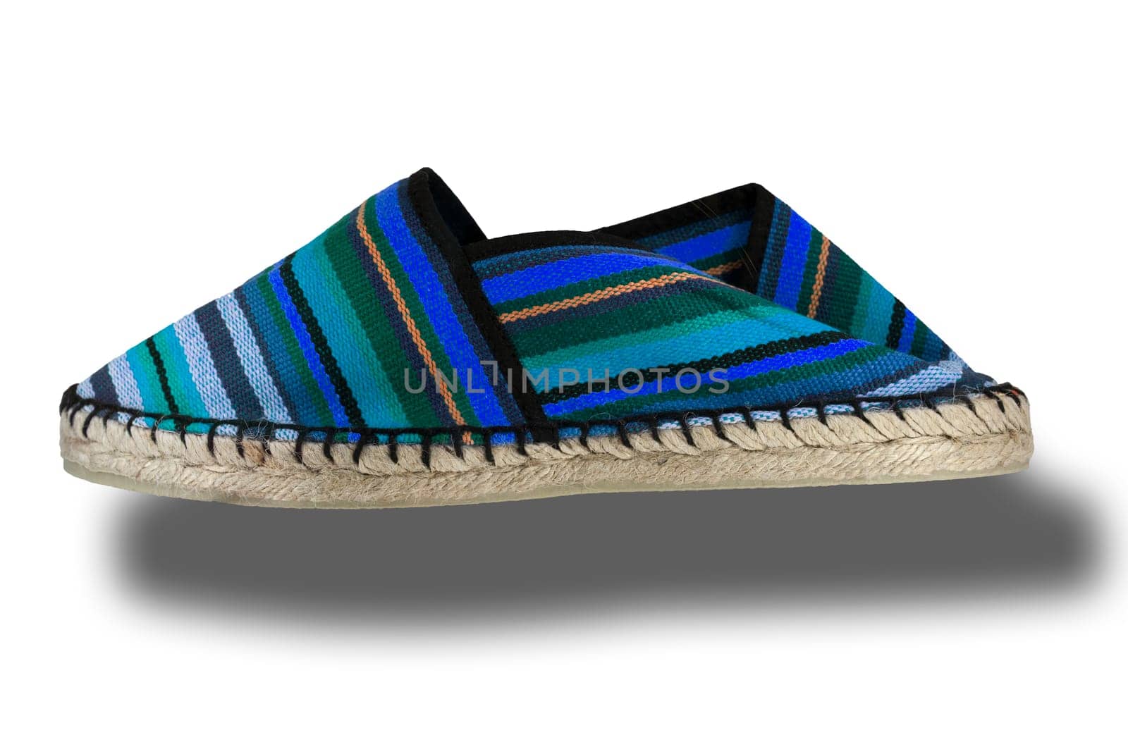 Espadrille shoe, traditional spanish shoes made of sparto rope and canvas. Isolated over white background