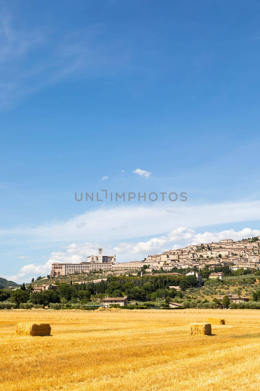 Assisi village in Umbria region, Italy. The town is famous for the most important Italian St. Francis Basilica (Basilica di San Francesco)