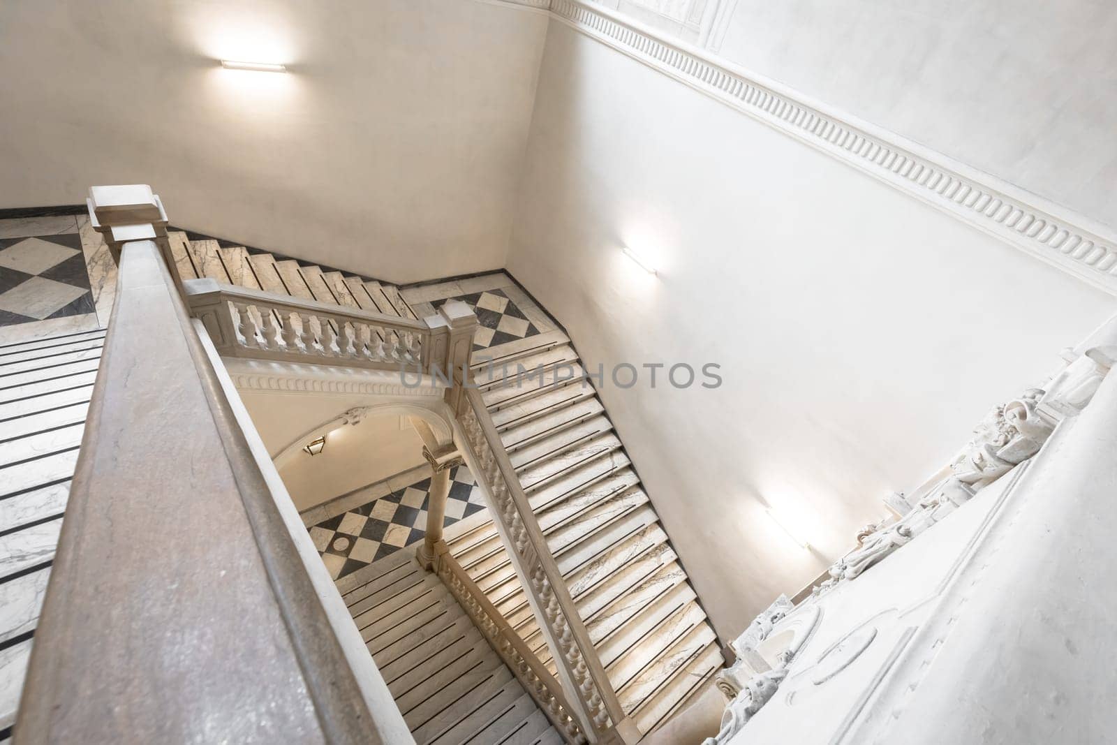 TURIN, ITALY - CIRCA MAY 2021: luxury staircase made of marble in an antique Italian palace
