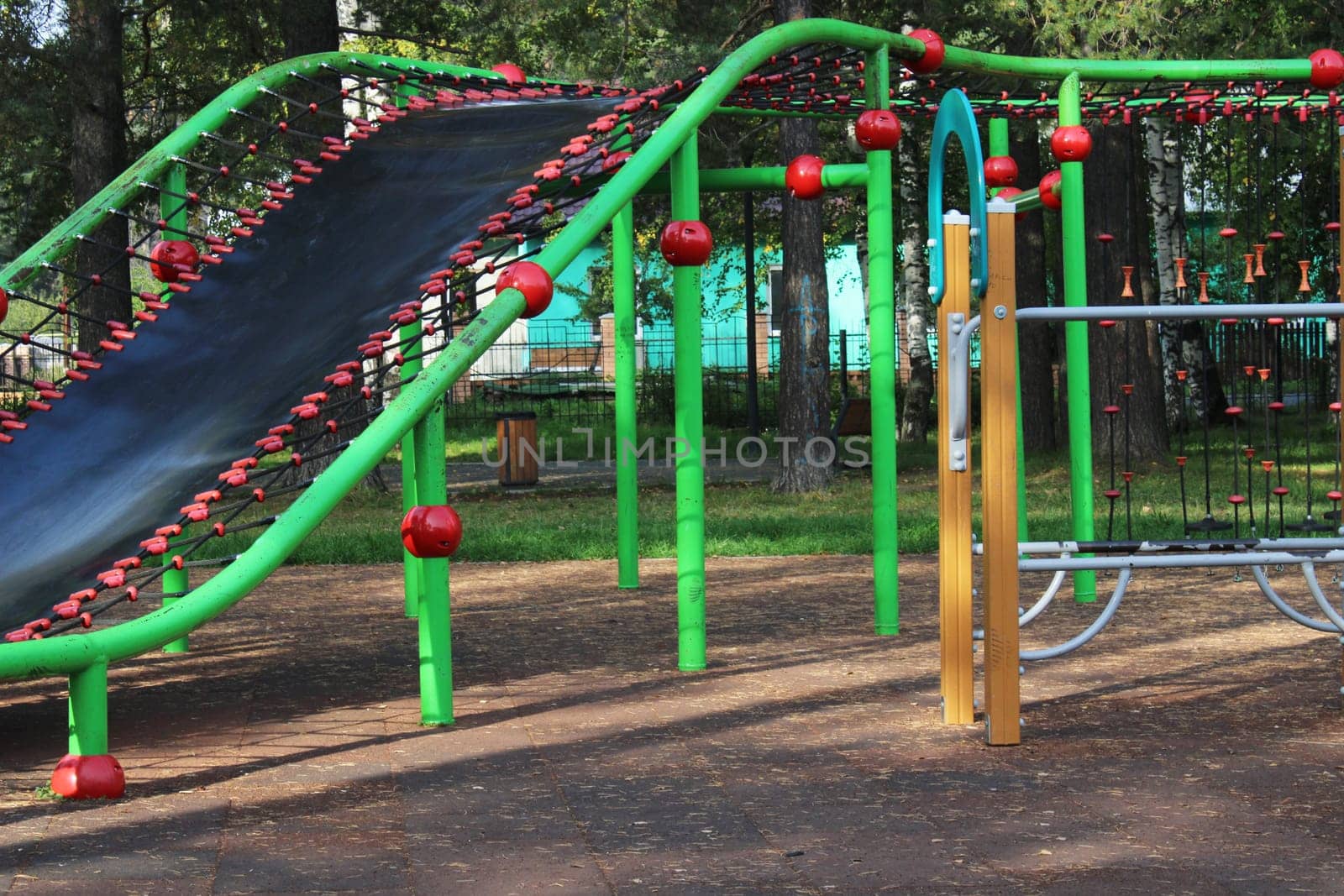 Children's playground with sports equipment in the city park. The concept of a healthy lifestyle.