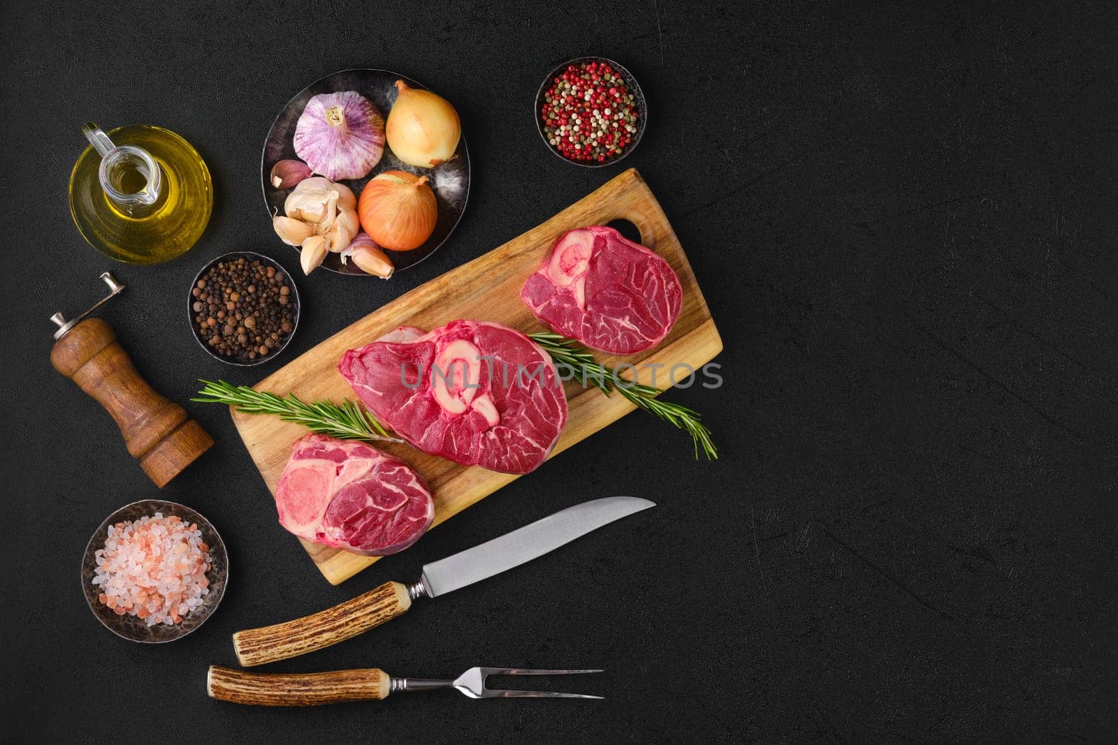 Overhead view of raw beef shank cross cut, ossobuco ready for cooking