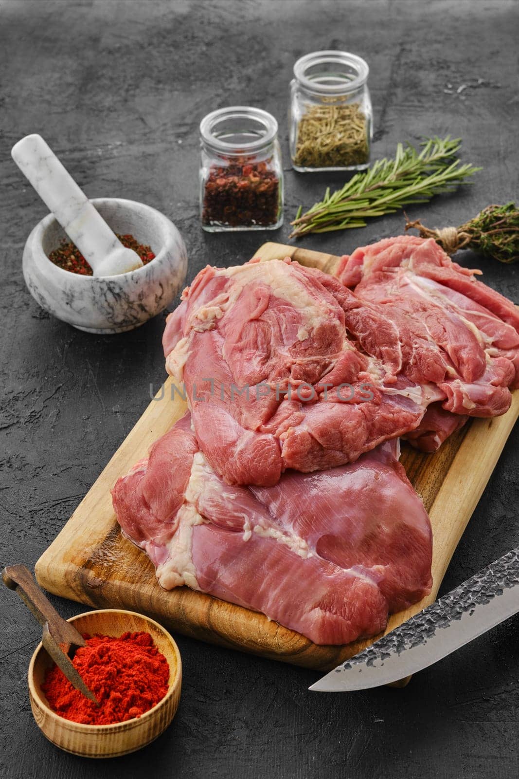Raw fresh boneless turkey thigh with spices