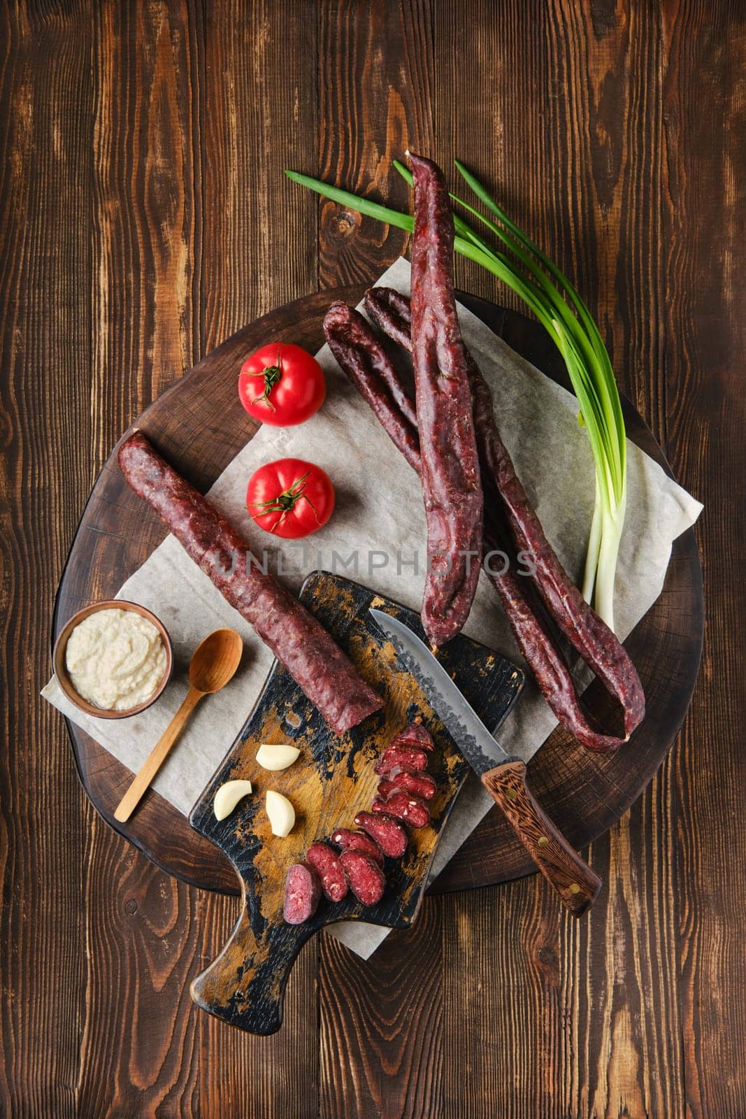 Overhead view of dried  sausage made of venison meat