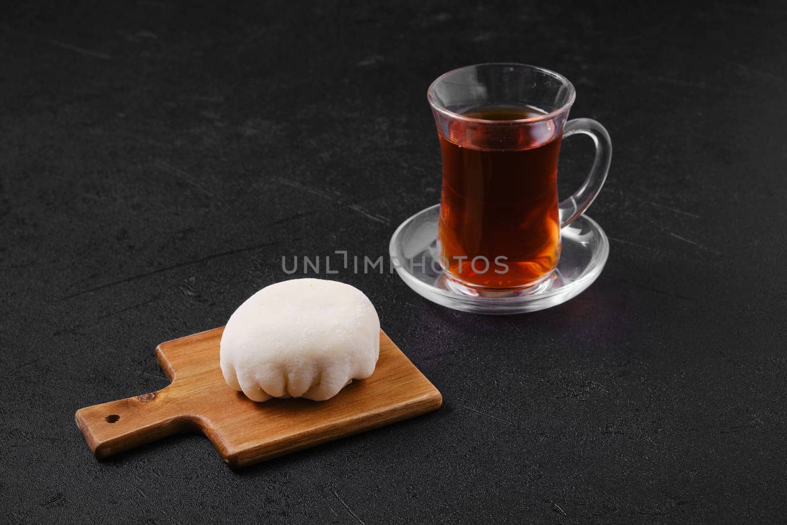 Sweet dessert mochi with coconut chips with fruit tea