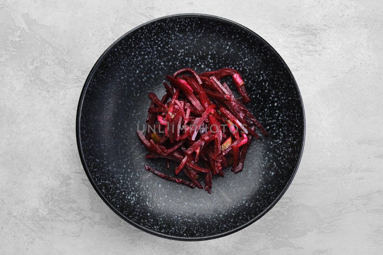 Garnish to the main dish -marinated slices of beetroot, top view