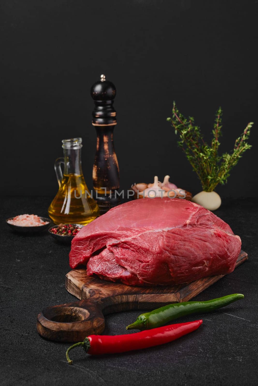 Raw beef top round meat, whole uncut section