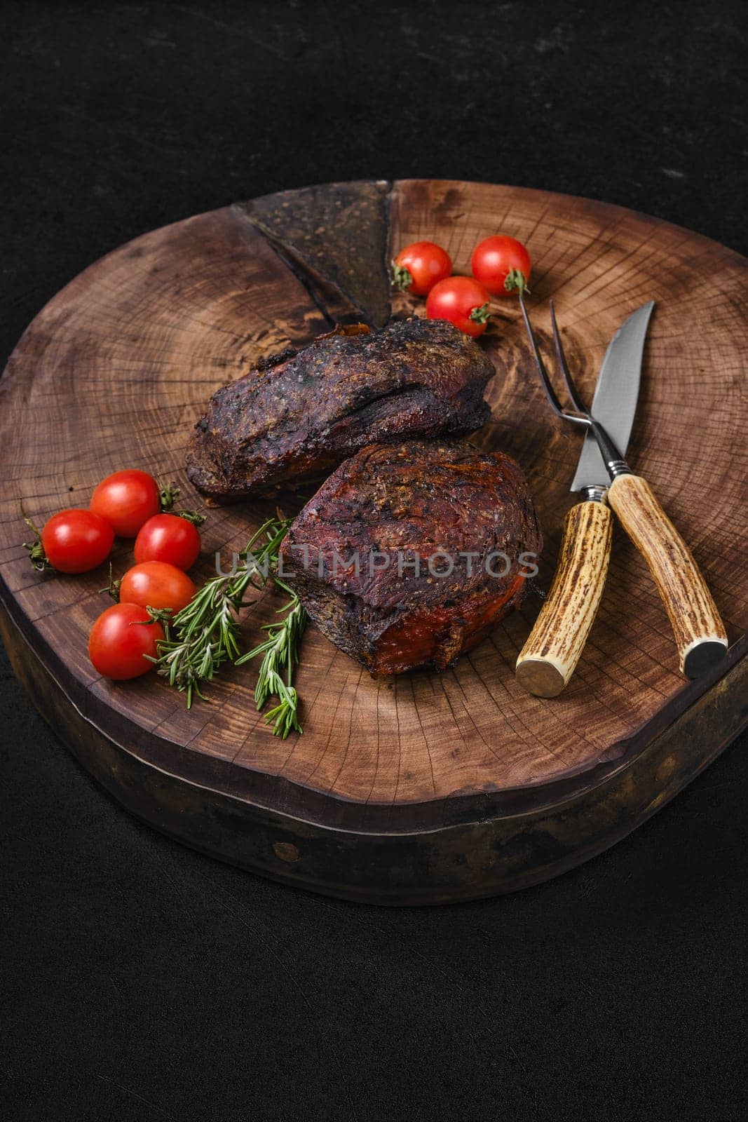Slow cooking concept - baked beef top round meat