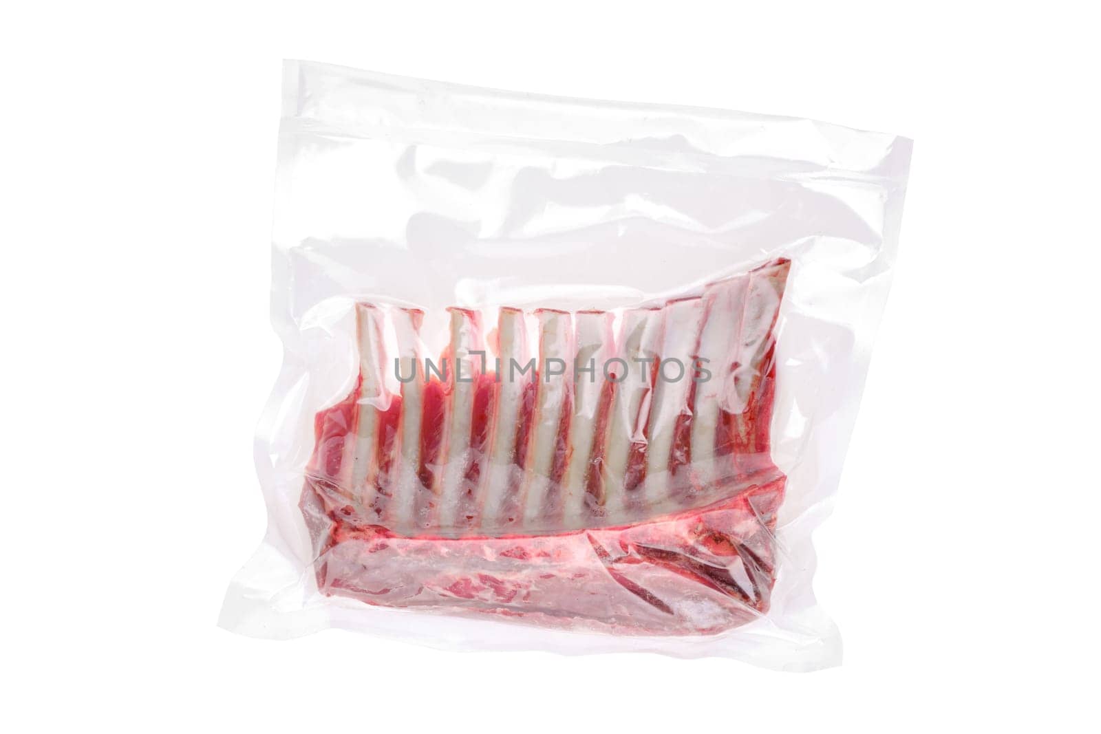 Vacuum sealed lamb ribs isolated on white