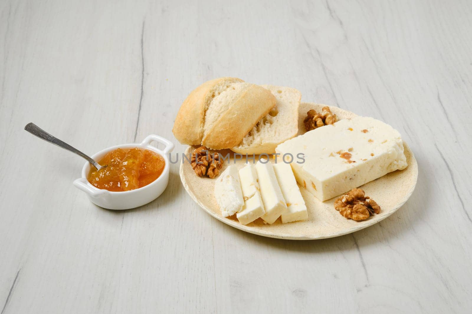 Healthy rustic breakfast. Homemade curd cheese with raisin and walnut