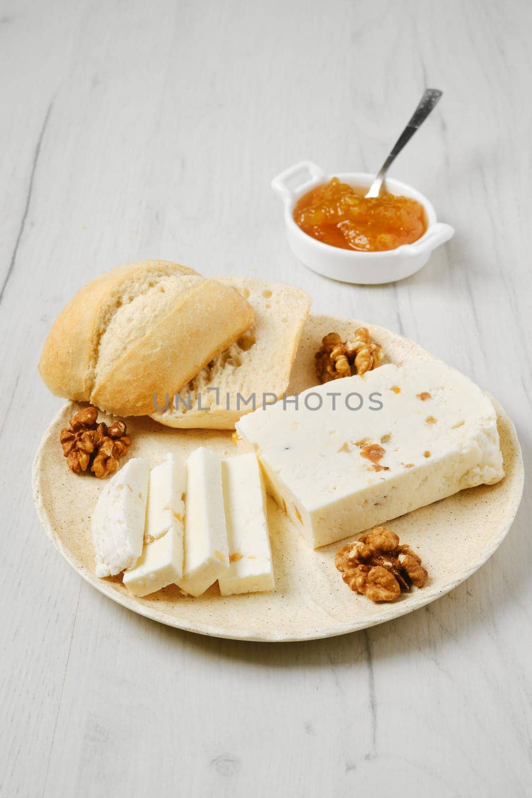 Healthy rustic breakfast. Homemade curd cheese with raisin and walnut