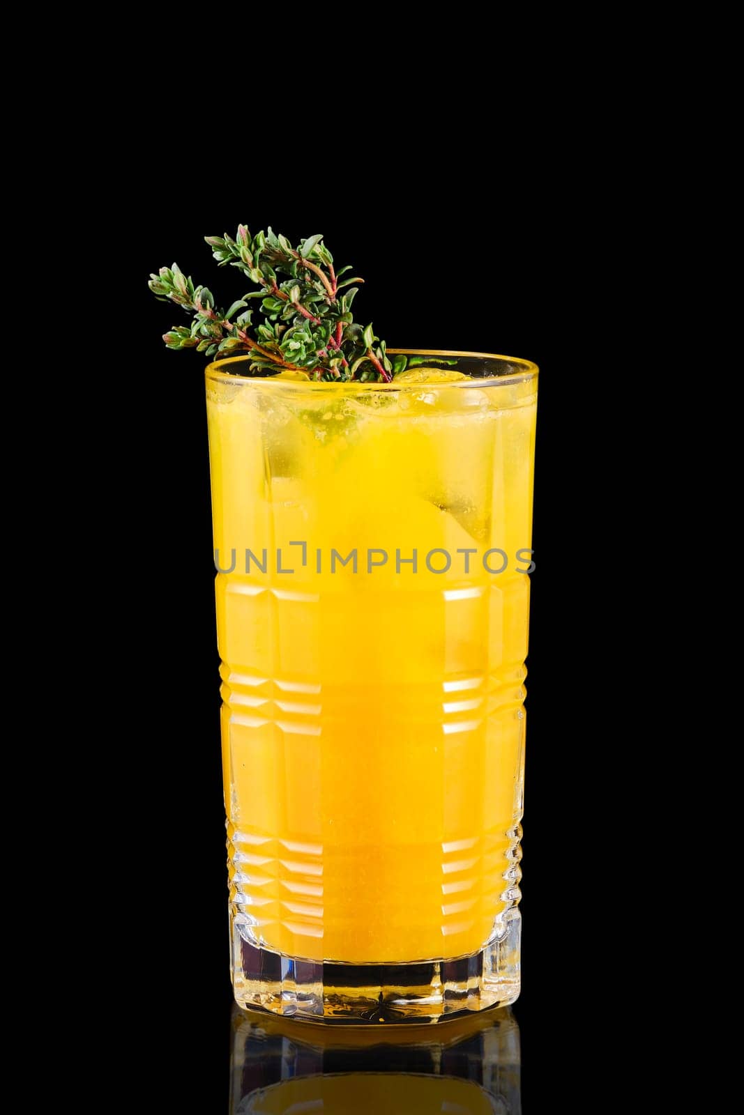 Cold orange lemonade with thyme flavor