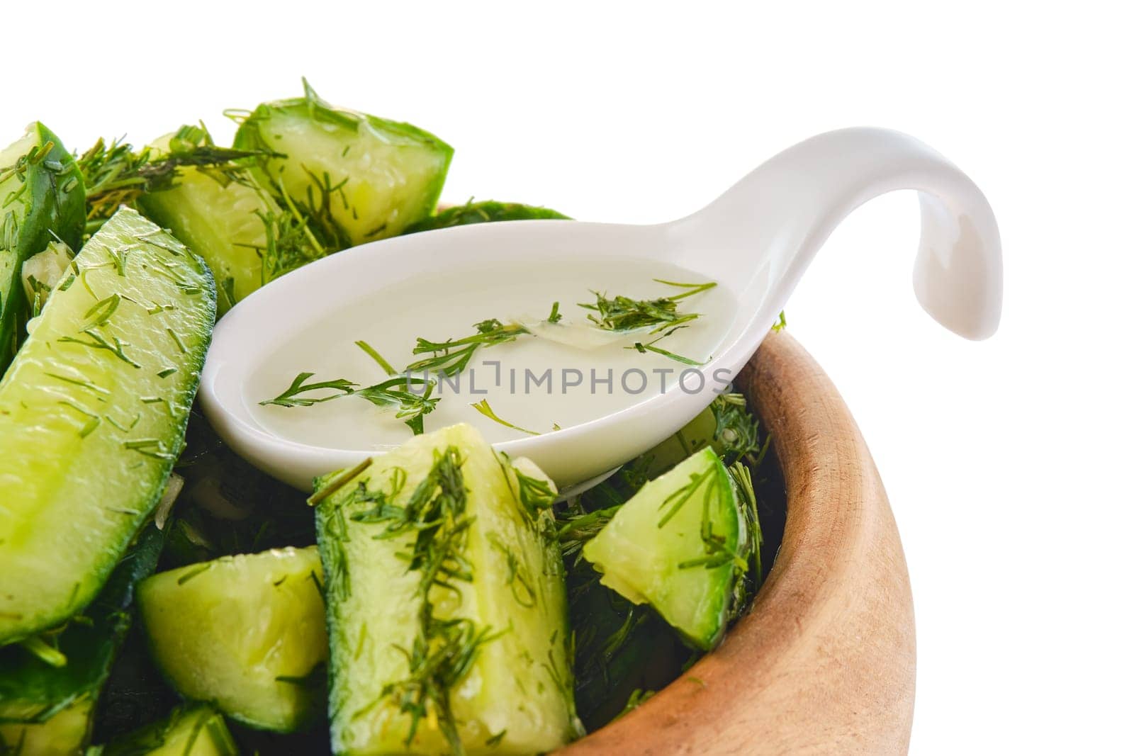 Closeup view of pickled cucumber with dill and garlic