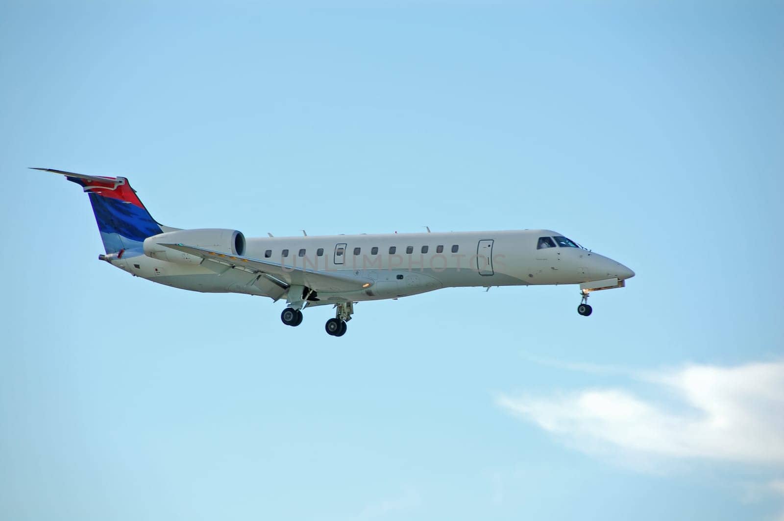 EMbraer ERJ-135 regional jet airplane approaching for landing