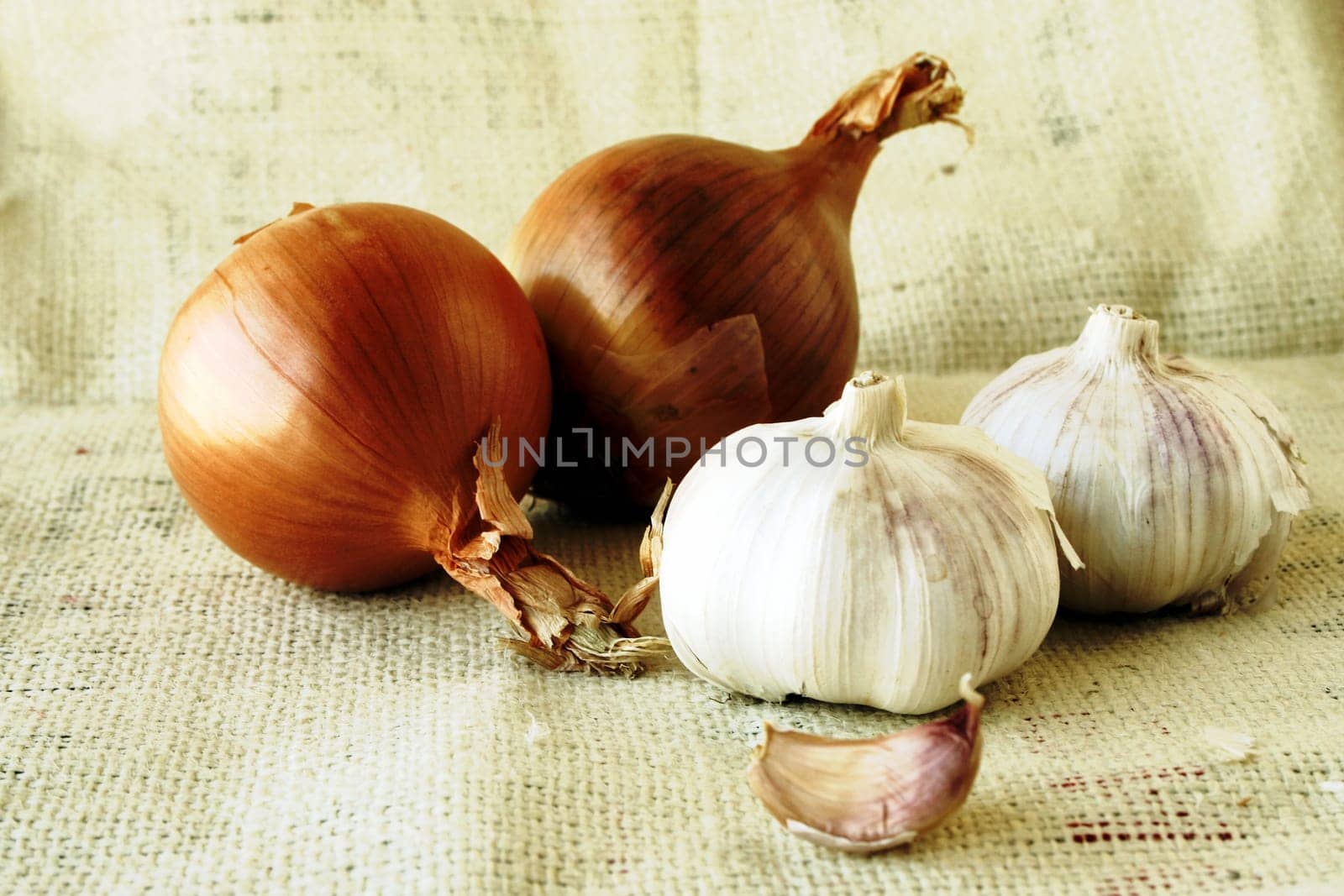 onion & garlic bulbs on jute cloth