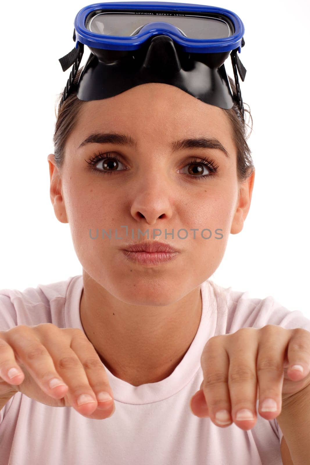 Stock photo of a young woman making funny face, funny snorkeling