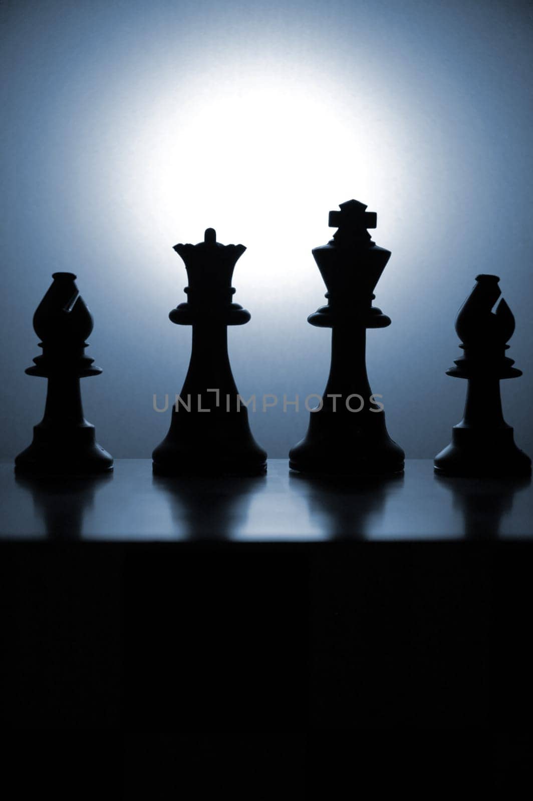 Low key Chess pieces in the studio.