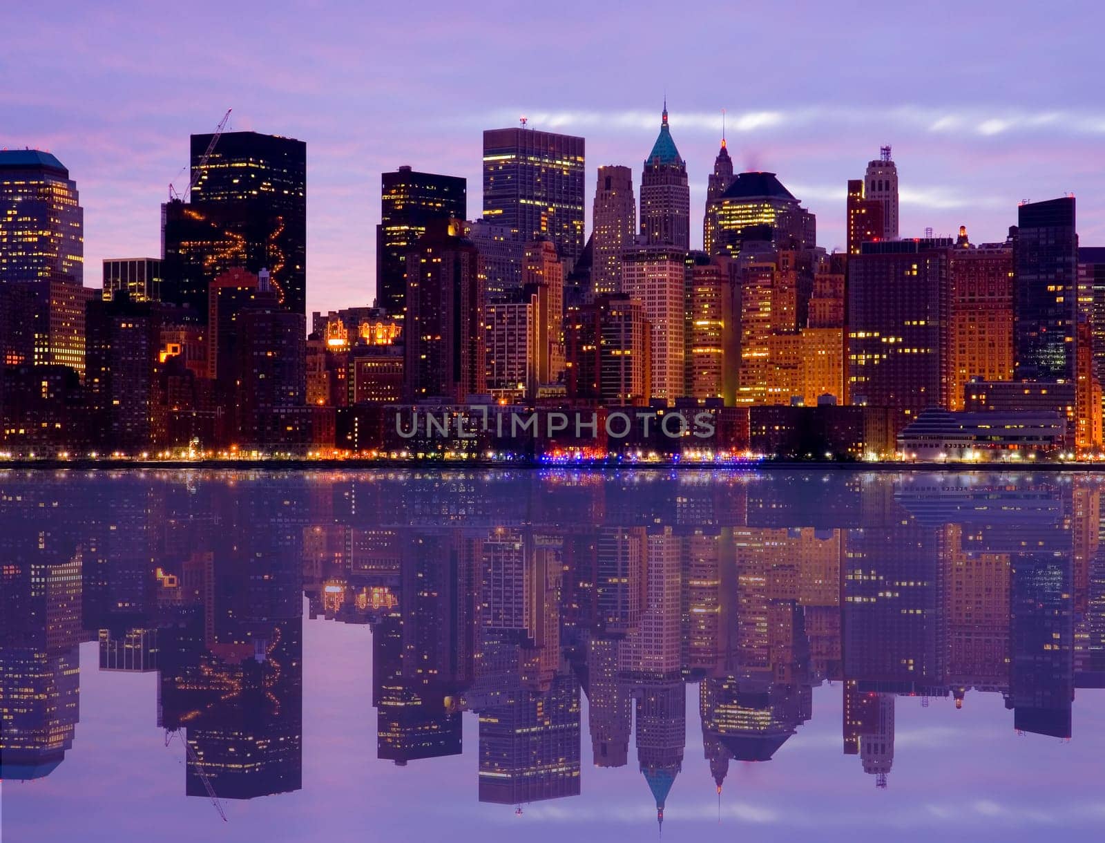 Early Morning Manhattan skyline with water reflection