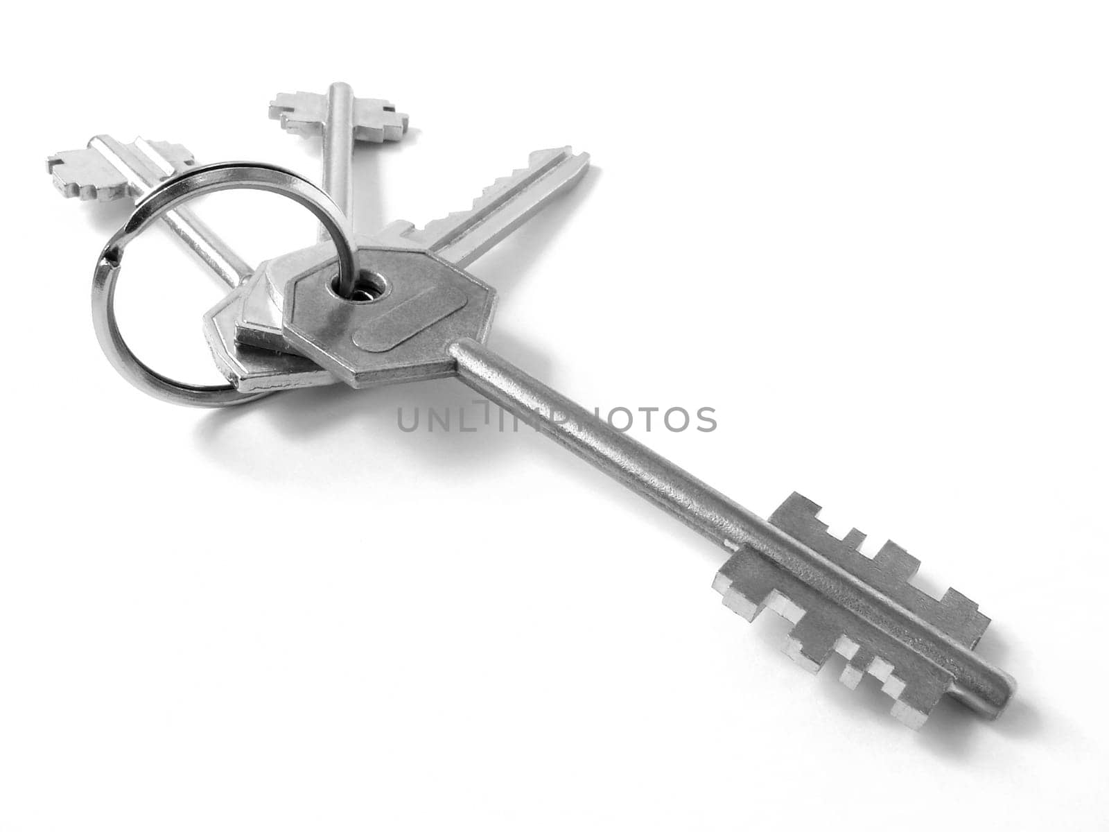 bunch of keys from door locks on the white background
