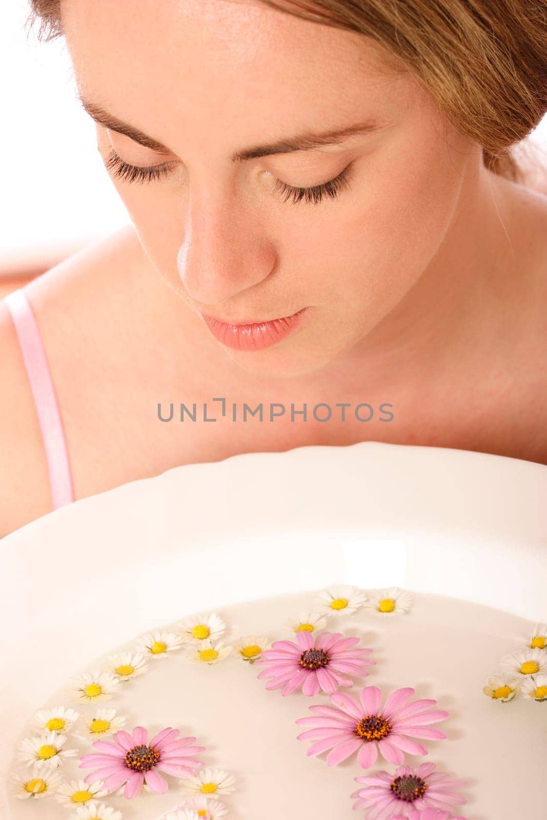 Stock photo of a young woman, beauty concept, facial wash